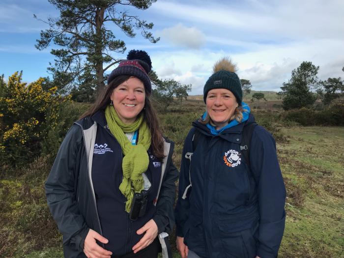 A photo of Wildlife Warden, Trudi with Julie from Devon Loves Dogs on the heaths.