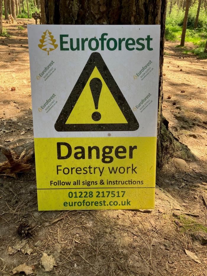A photo of a sign advising caution due to forestry operations