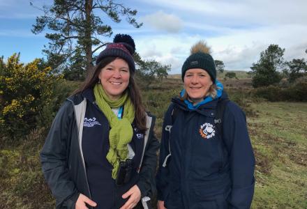 A photo of Wildlife Warden, Trudi with Julie from Devon Loves Dogs on the heaths.